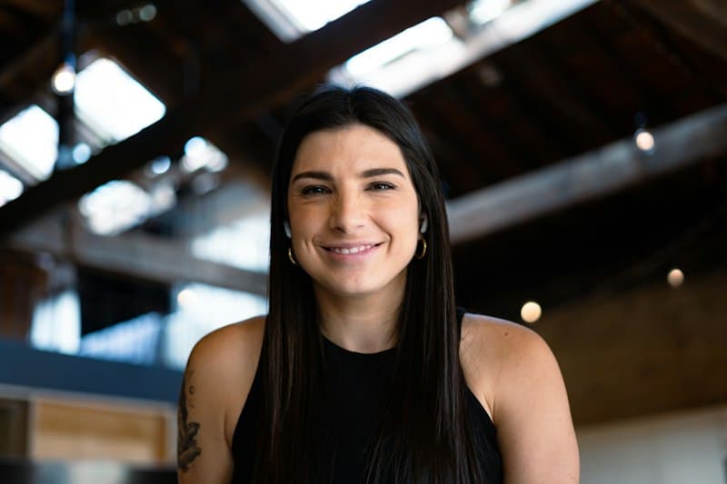 Smiling woman in a black top