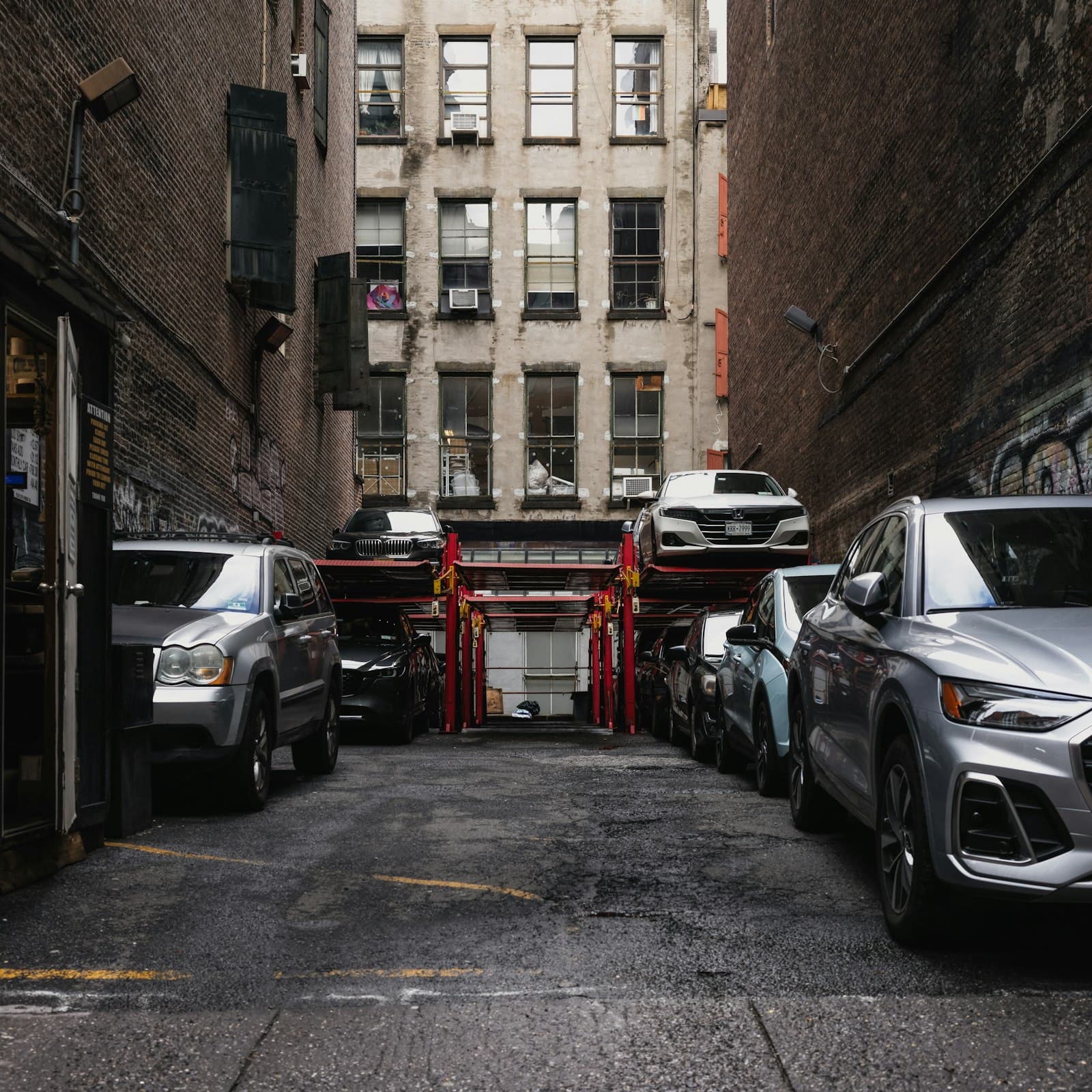 Cars parked in a multi-level city parking garage