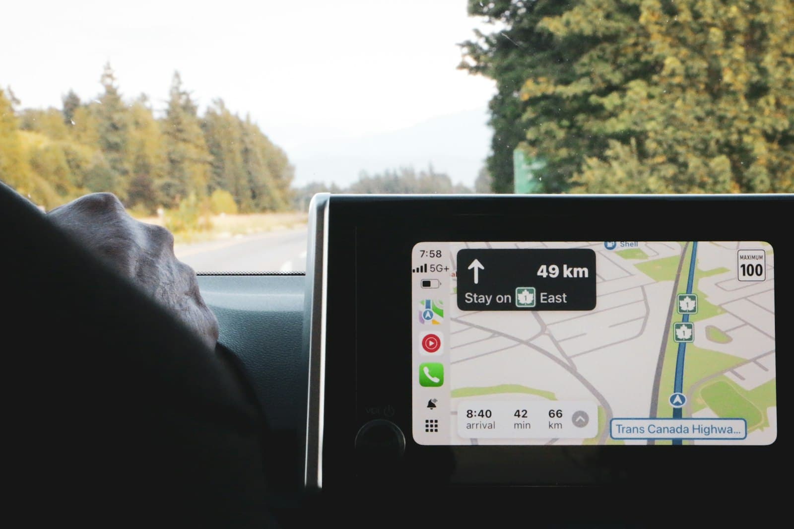 In-car navigation screen showing turn-by-turn directions