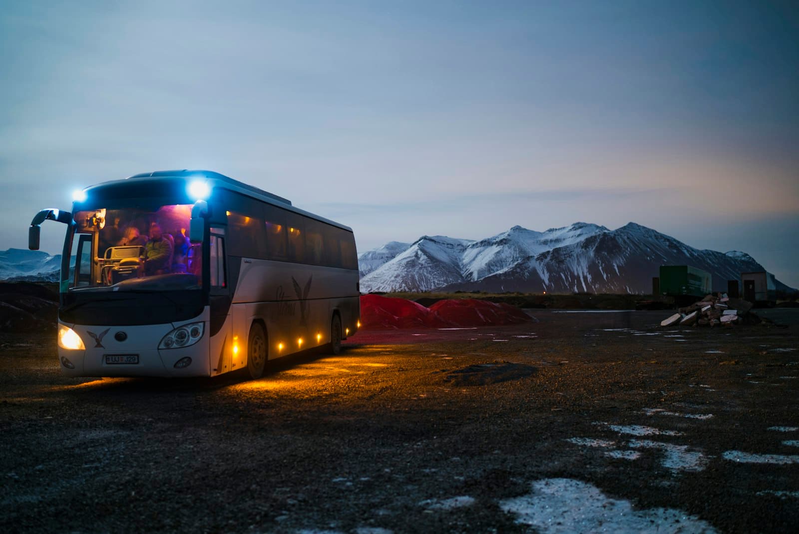 Passenger bus parked at dusk
