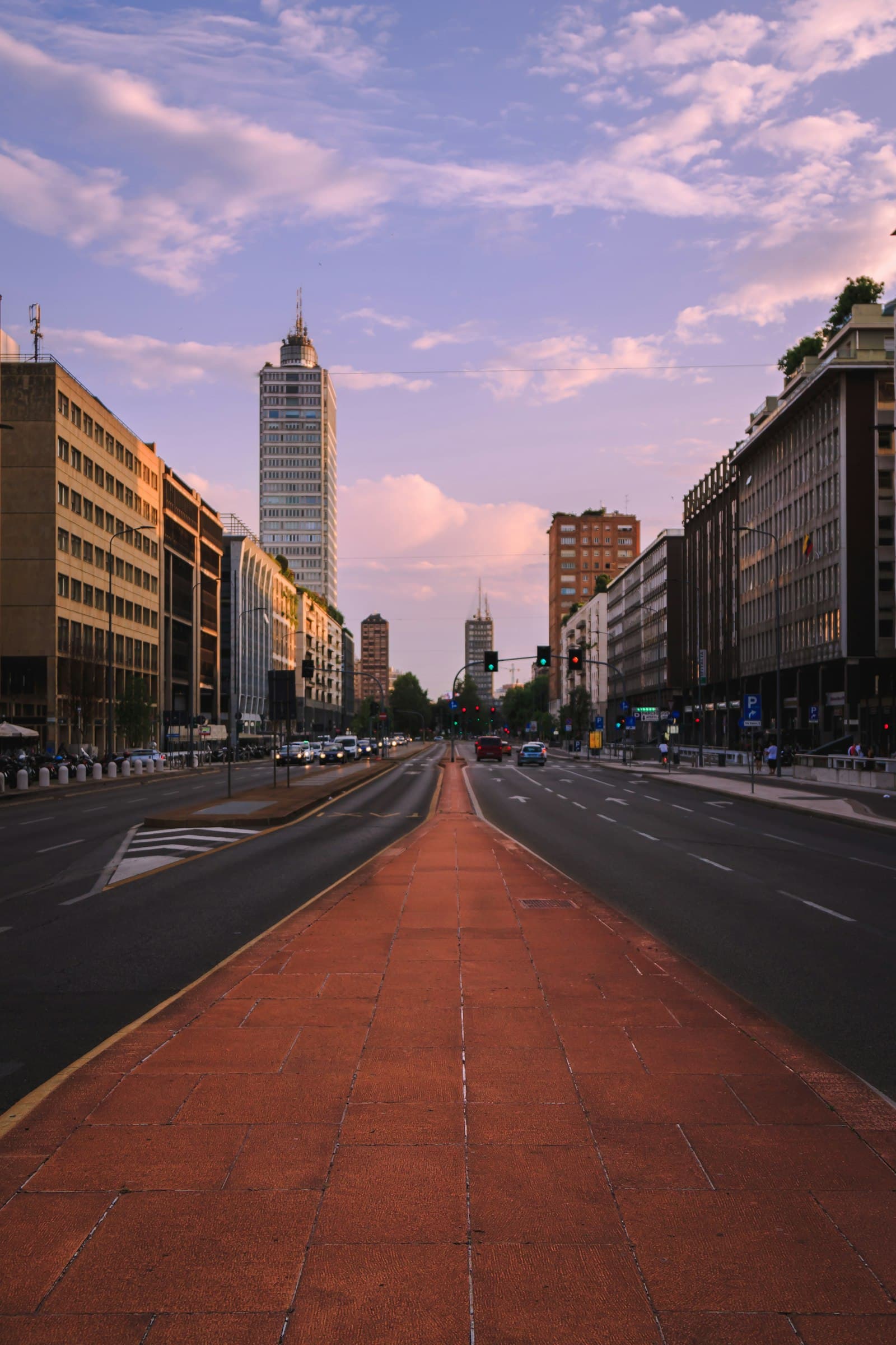 City street lined with tall buildings